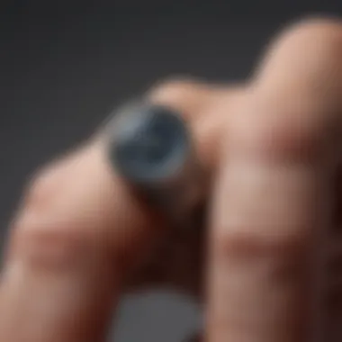 A close-up view of a measuring tape wrapped around a finger for size determination