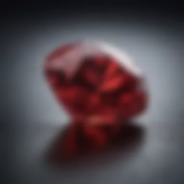 Vivid Ruby Gemstone A vivid ruby gemstone on a textured surface, showcasing its rich color