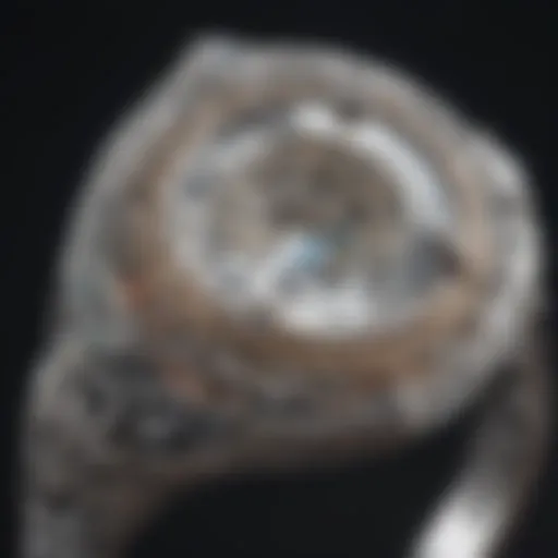 A close-up of an antique diamond engagement ring showcasing intricate filigree work