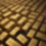 An assortment of gold bars showcasing different purity levels