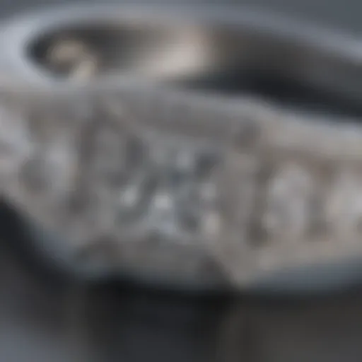 Close-up of a princess cut pave diamond engagement ring showcasing intricate designs