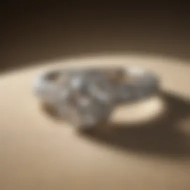 Elegant Display of Round Pave Engagement Ring An elegant round pave engagement ring displayed on a velvet surface.