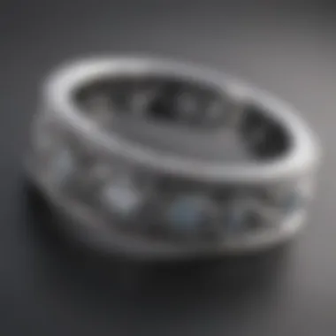 Close-up of a platinum wedding band with intricate design