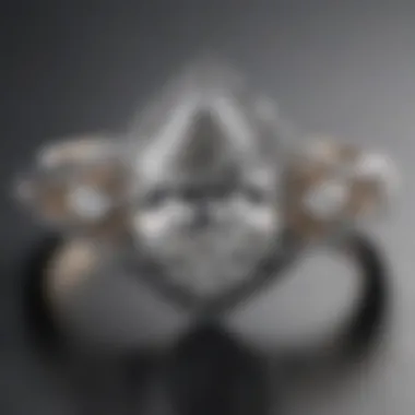 Stunning pear-shaped diamond engagement ring featuring intricate band design